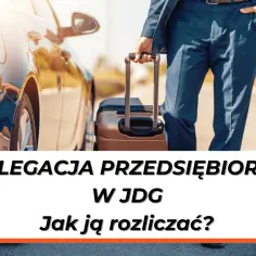 Biznesmen z walizką przy samochodzie. Jak rozliczyć delegację właściciela w jednoosobowej działalności b2b?